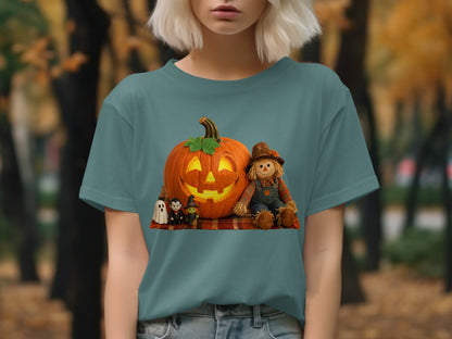 Jack-o'-lantern, scarecrow, witch, vampire, and ghost on plaid fabric.