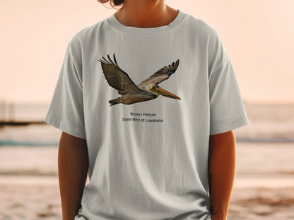 Brown Pelican, State Bird of Louisiana graphic on a grey t-shirt.