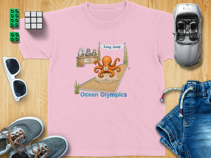Pink t-shirt with cartoon octopus competing in a long jump at the Ocean Olympics.