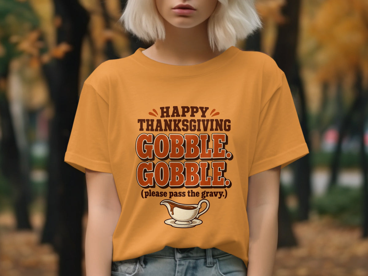 Orange t-shirt with "Happy Thanksgiving Gobble Gobble" text and gravy boat illustration.
