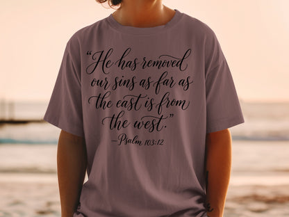 T-shirt with "He has removed our sins as far as the east is from the west." -Psalm 103:12.