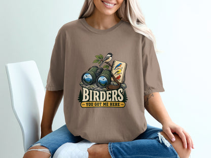 Birders graphic with binoculars, bird, notebook and text "Birders you got me here".