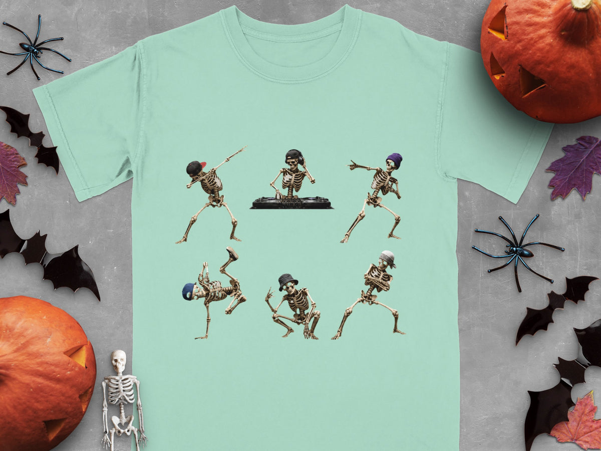 T-shirt with five skeletons dancing and one DJing, surrounded by Halloween decorations.