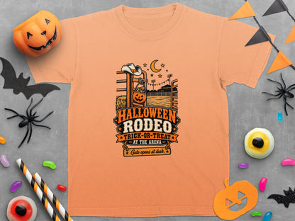 Orange t-shirt with "Halloween Rodeo Trick-or-Treat" graphic and cowboy hat.