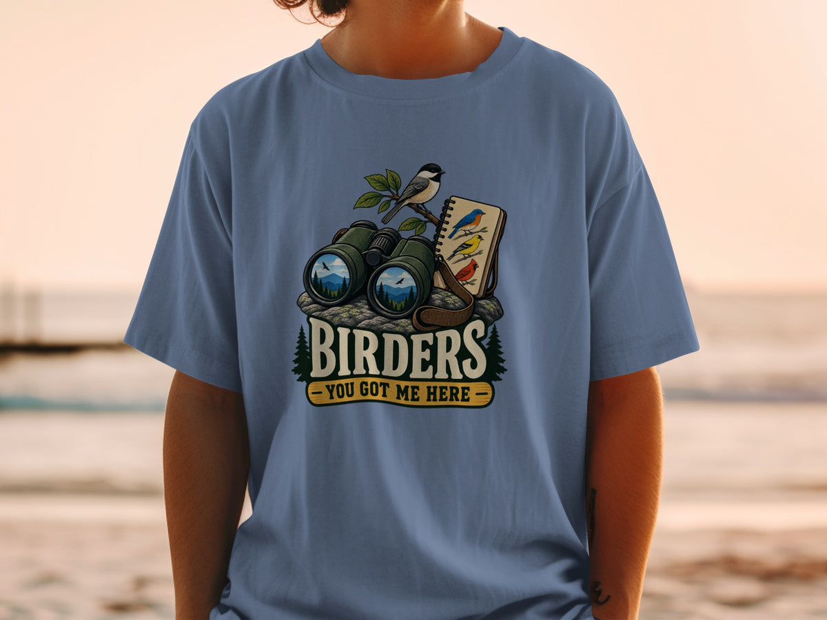 Birding graphic with binoculars, notebook, birds, and text "BIRDERS - YOU GOT ME HERE".