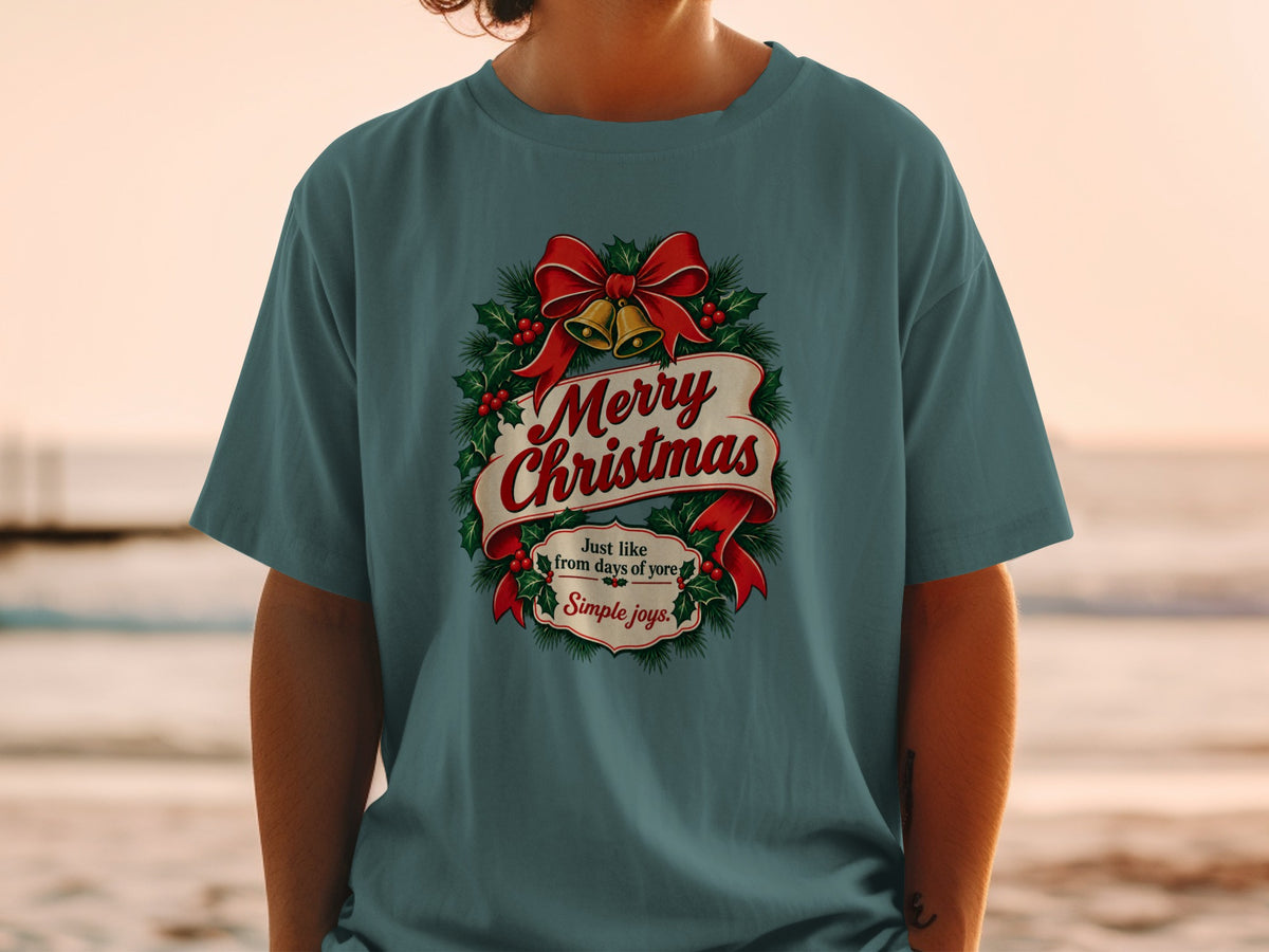 Teal t-shirt with "Merry Christmas" and "Simple joys" festive graphic.