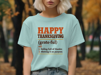 Light blue t-shirt with "Happy Thanksgiving (grateful) adj. 1. feeling full of thanks; 2. showing it on purpose." text.