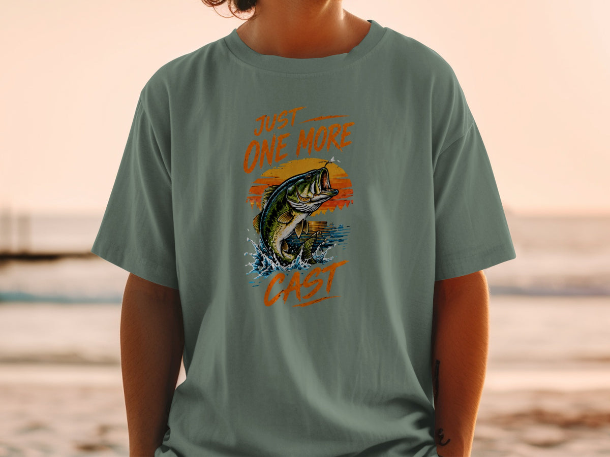 T-shirt with bass jumping from water with text "JUST ONE MORE CAST"