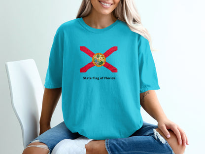 Turquoise t-shirt featuring the Florida State Flag and "State Flag of Florida" text.