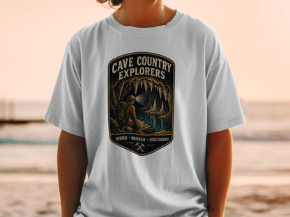 Cave Country Explorers t-shirt with a cave graphic and text "Deeper Darker Discovery".