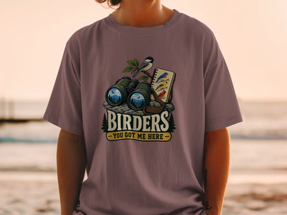 Graphic of binoculars, birds, and trees with text "BIRDERS - YOU GOT ME HERE".