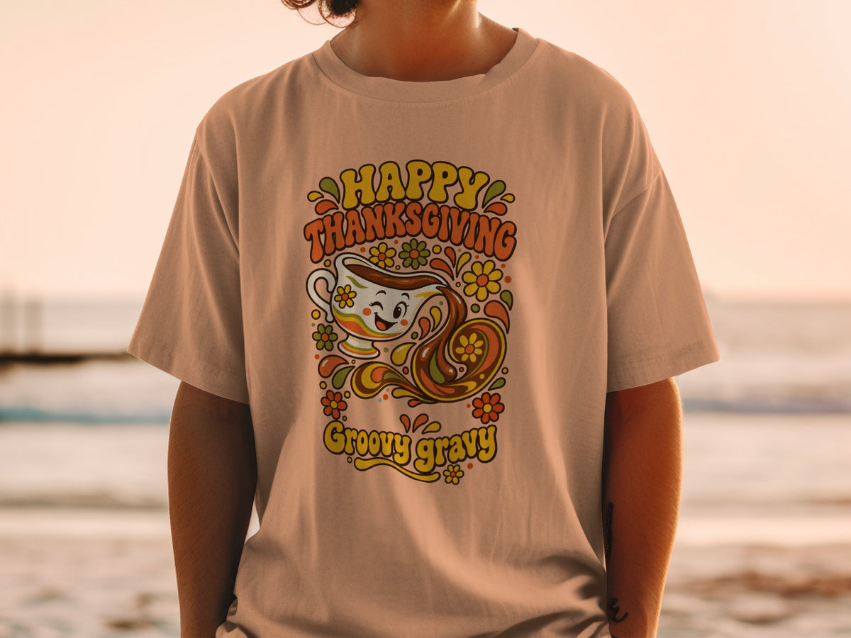 T-shirt with "Happy Thanksgiving Groovy Gravy" text and a smiling gravy boat.