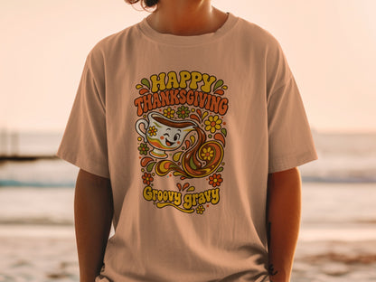T-shirt with "Happy Thanksgiving Groovy Gravy" text and a smiling gravy boat.