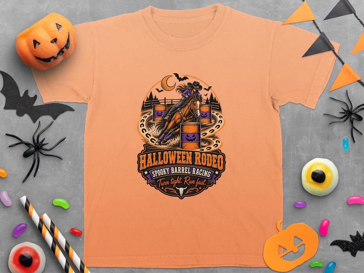 Orange t-shirt with Halloween Rodeo design: spooky barrel racing, turn tight, run fast.