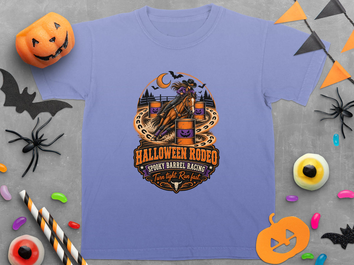 T-shirt with a Halloween Rodeo graphic featuring a barrel racer, pumpkins, bats, and the text "Halloween Rodeo".