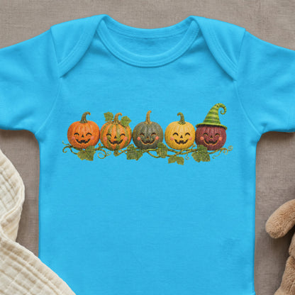 Blue bodysuit with a row of smiling jack-o'-lanterns wearing a striped witch hat.