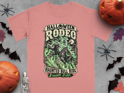 Pink t-shirt with "Halloween Rodeo Haunted Bull Ride" graphic.