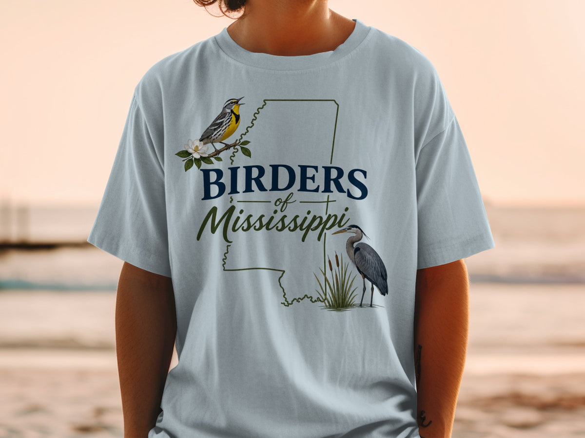 T-shirt with "Birders of Mississippi" text, a yellow bird, and a heron.