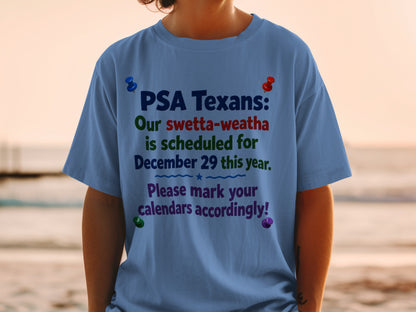Light blue t-shirt with text "PSA Texans: Our swetta-weatha is scheduled for December 29 this year."