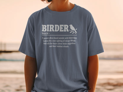 Blue t-shirt with "Birder Noun" definition and a bird illustration.