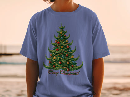 Blue t-shirt with a decorated Christmas tree and "Merry Christmas!" text.