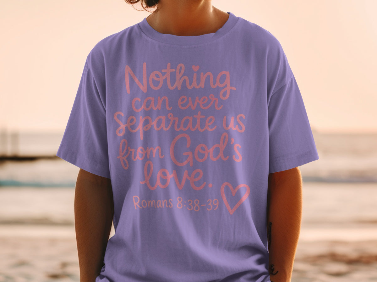 Purple t-shirt with pink text "Nothing can ever separate us from God's love. Romans 8:38-39".