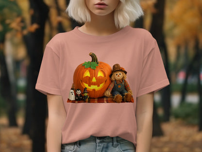 Halloween graphic with grinning jack-o'-lantern, scarecrow, ghost, and vampire on plaid blanket.