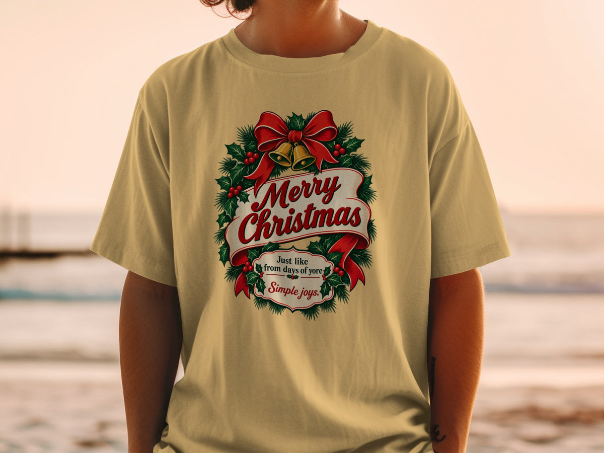 Yellow t-shirt with a Merry Christmas wreath graphic featuring bells and text.