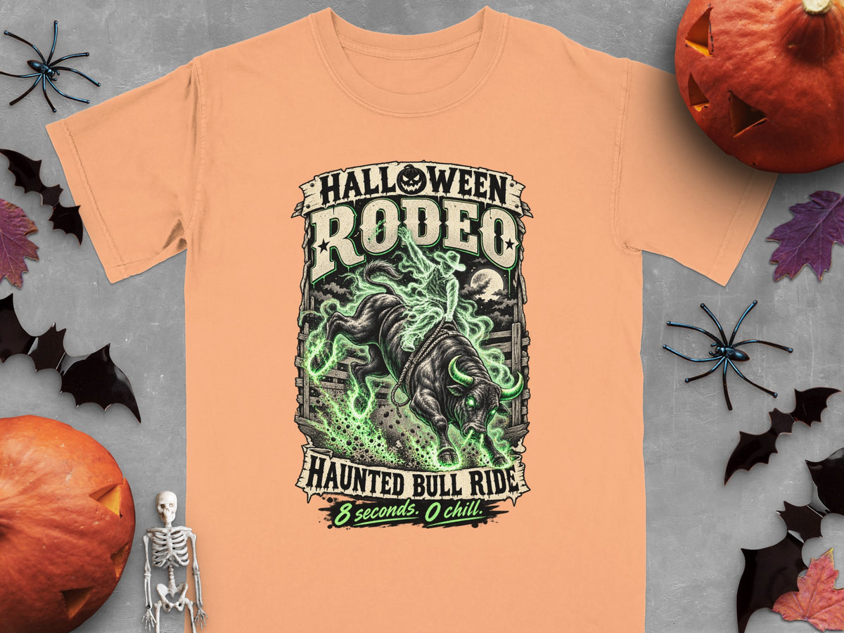 Peach t-shirt with "Halloween Rodeo Haunted Bull Ride" graphic and 8 seconds, 0 chill.
