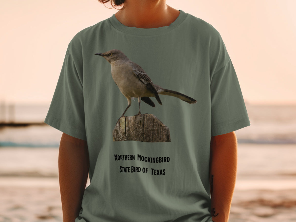 Northern Mockingbird, State Bird of Texas graphic on a t-shirt.
