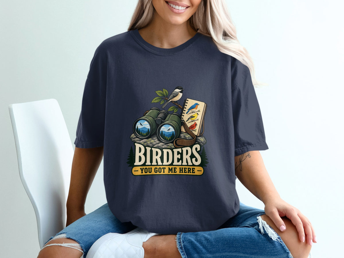 Binoculars, a bird on a branch, and a sketchbook with birds, with text "BIRDERS YOU GOT ME HERE".