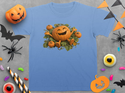 Blue t-shirt with a cheerful pumpkin graphic surrounded by leaves and smaller pumpkins.