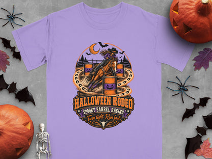 Halloween Rodeo graphic with spooky barrel racing text on a lavender t-shirt.