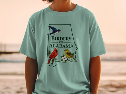 T-shirt with outline of Alabama, swallow, cardinal, and yellowhammer bird graphic.