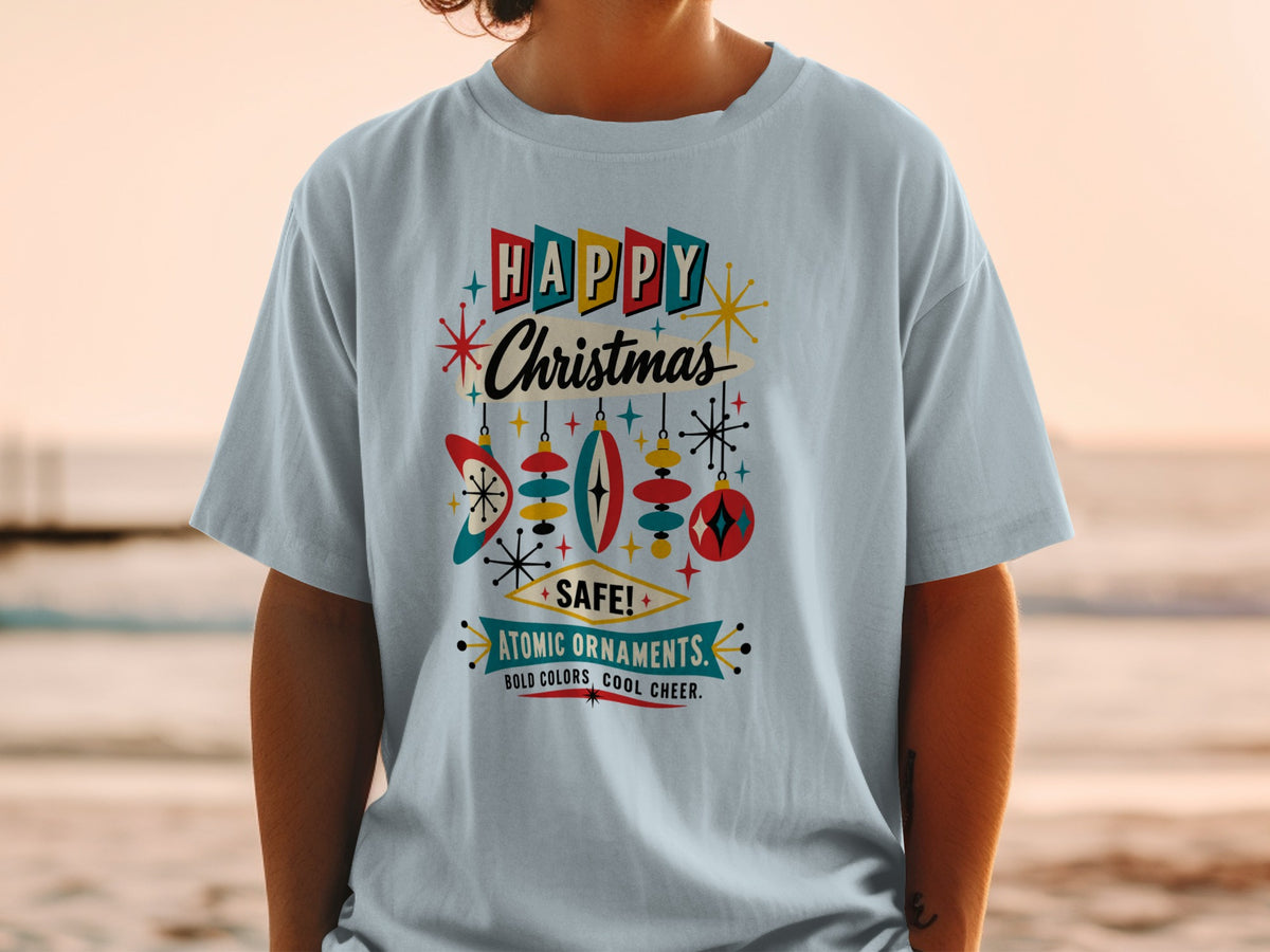 Light blue t-shirt with "Happy Christmas" and "Atomic Ornaments" design.