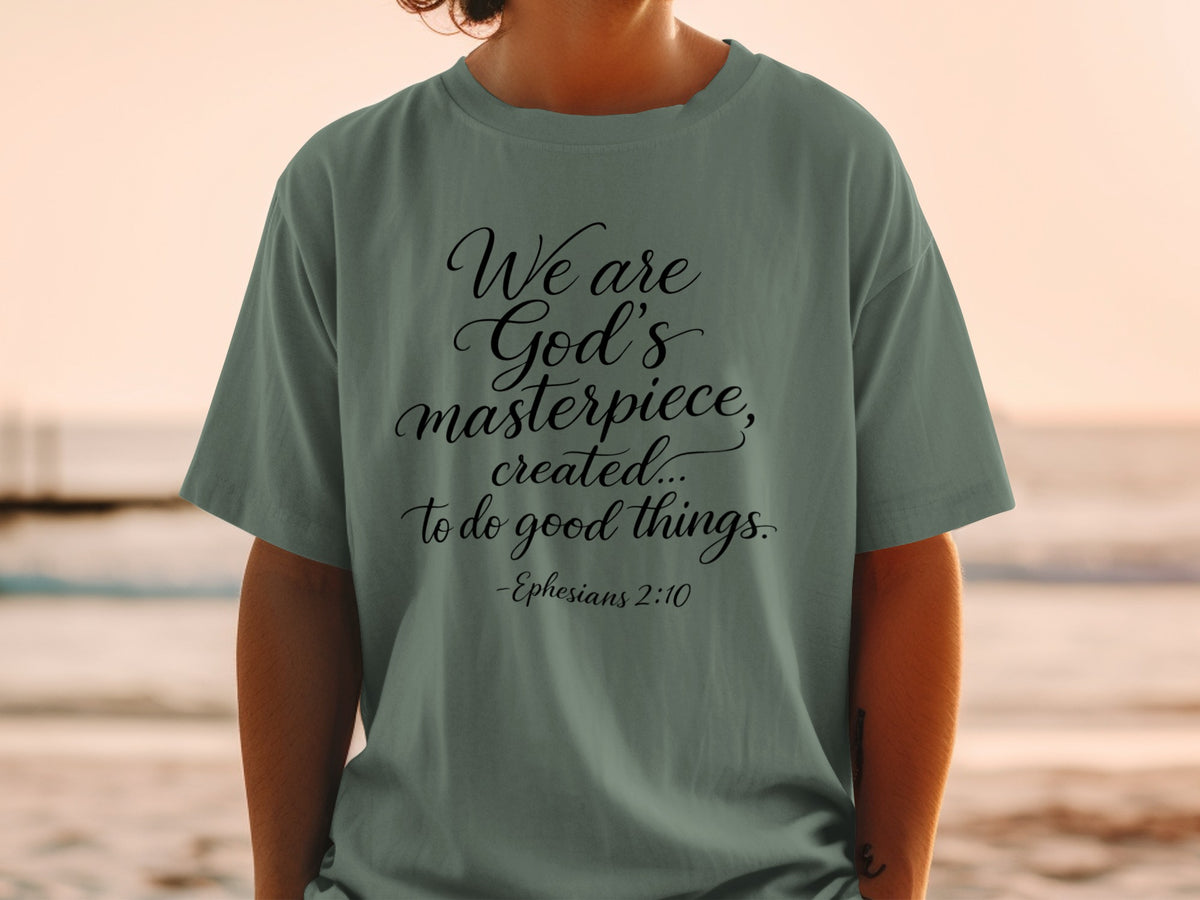 Green t-shirt with "We are God's masterpiece, created... to do good things. -Ephesians 2:10" text.