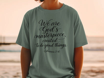 Green t-shirt with "We are God's masterpiece, created... to do good things. -Ephesians 2:10" text.