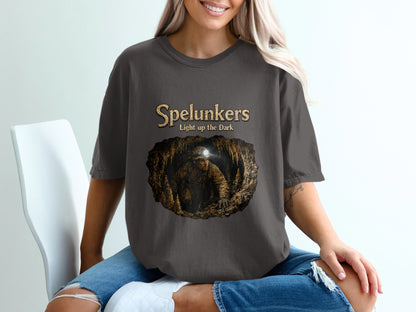 Spelunkers t-shirt with cave explorer graphic and text "Light up the Dark".