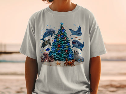Christmas tree surrounded by dolphins, manta ray, whale shark, seal, octopus, crab, starfish, and fish.