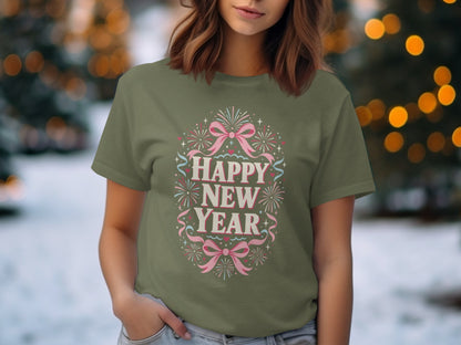 Green t-shirt with "Happy New Year" text, pink bows, and fireworks graphic.