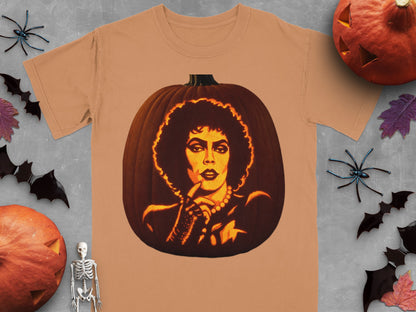 Tan turgid t-shirt featuring a carved pumpkin graphic of Frank-N-Furter, surrounded by Halloween decorations.