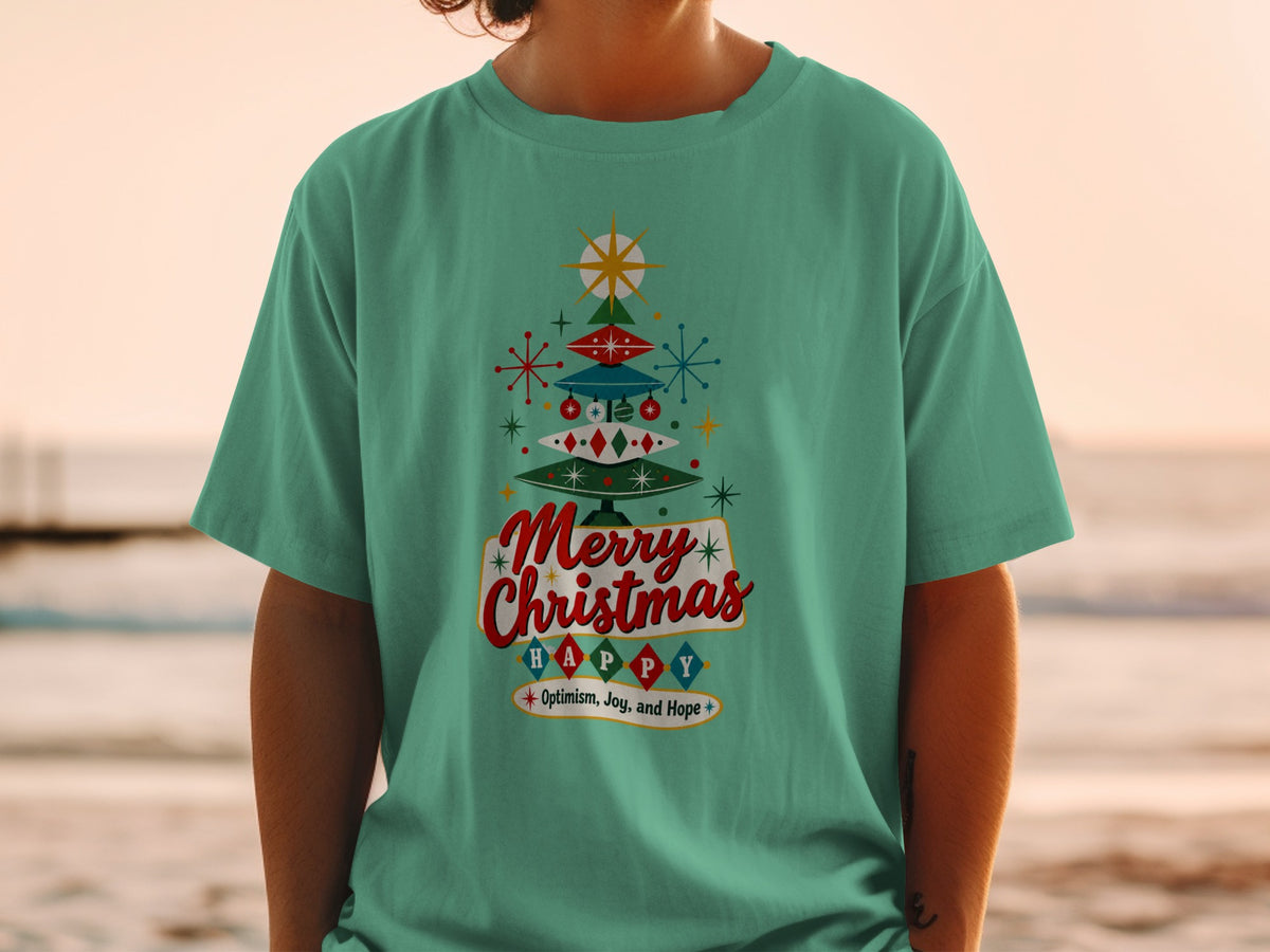 Green t-shirt with retro Christmas tree graphic and "Merry Christmas Happy" text.