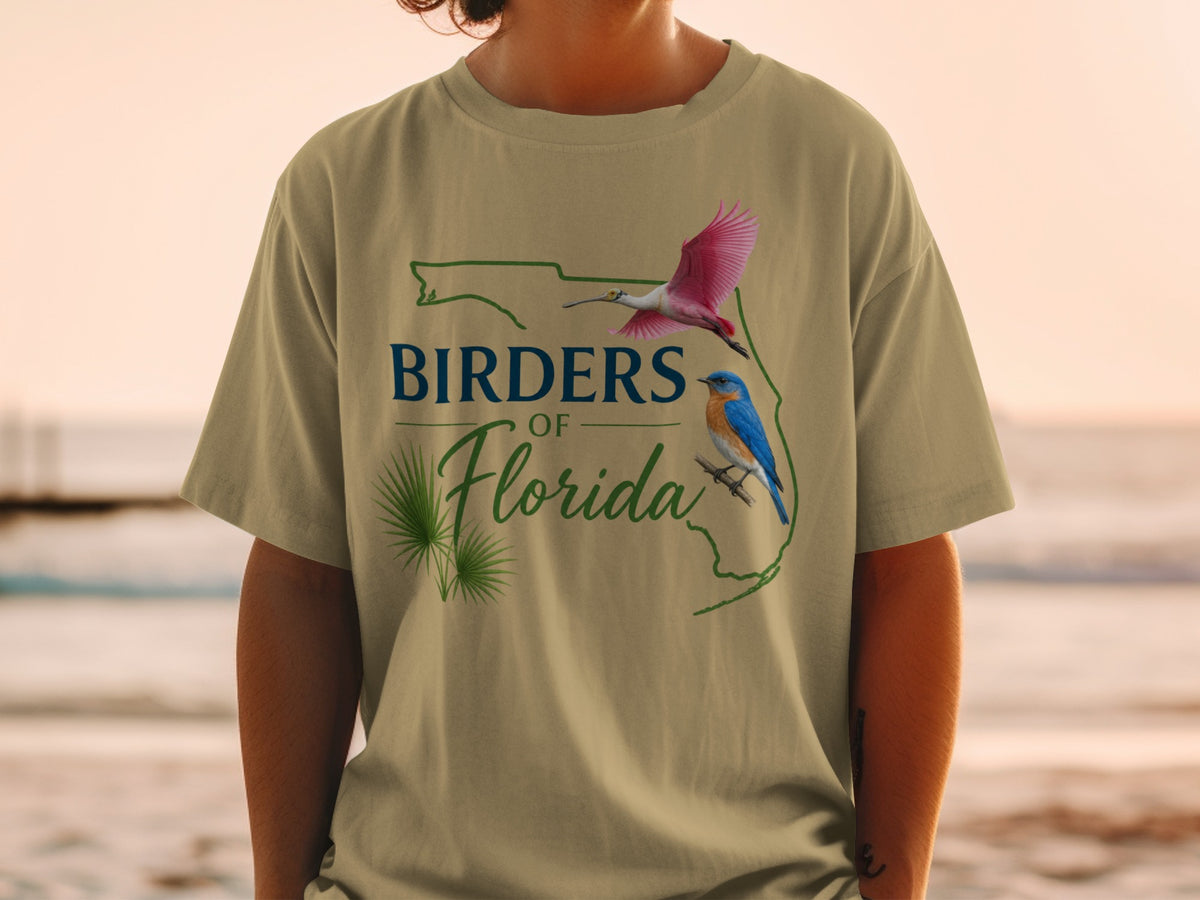 T-shirt with "Birders of Florida" text, a pink bird, and a bluebird.
