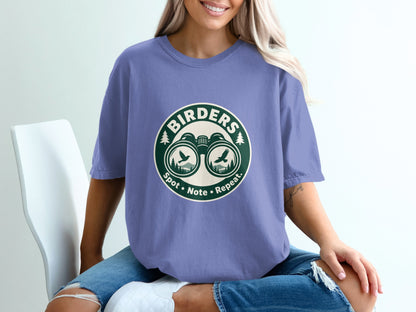 T-shirt with circular "Birders" graphic featuring binoculars, birds, and trees.