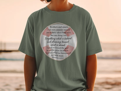 Green t-shirt with Philippians 3:13-14 Bible verse inside a life preserver graphic.