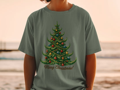 Green t-shirt with vintage Christmas tree graphic and "Merry Christmas!" text.