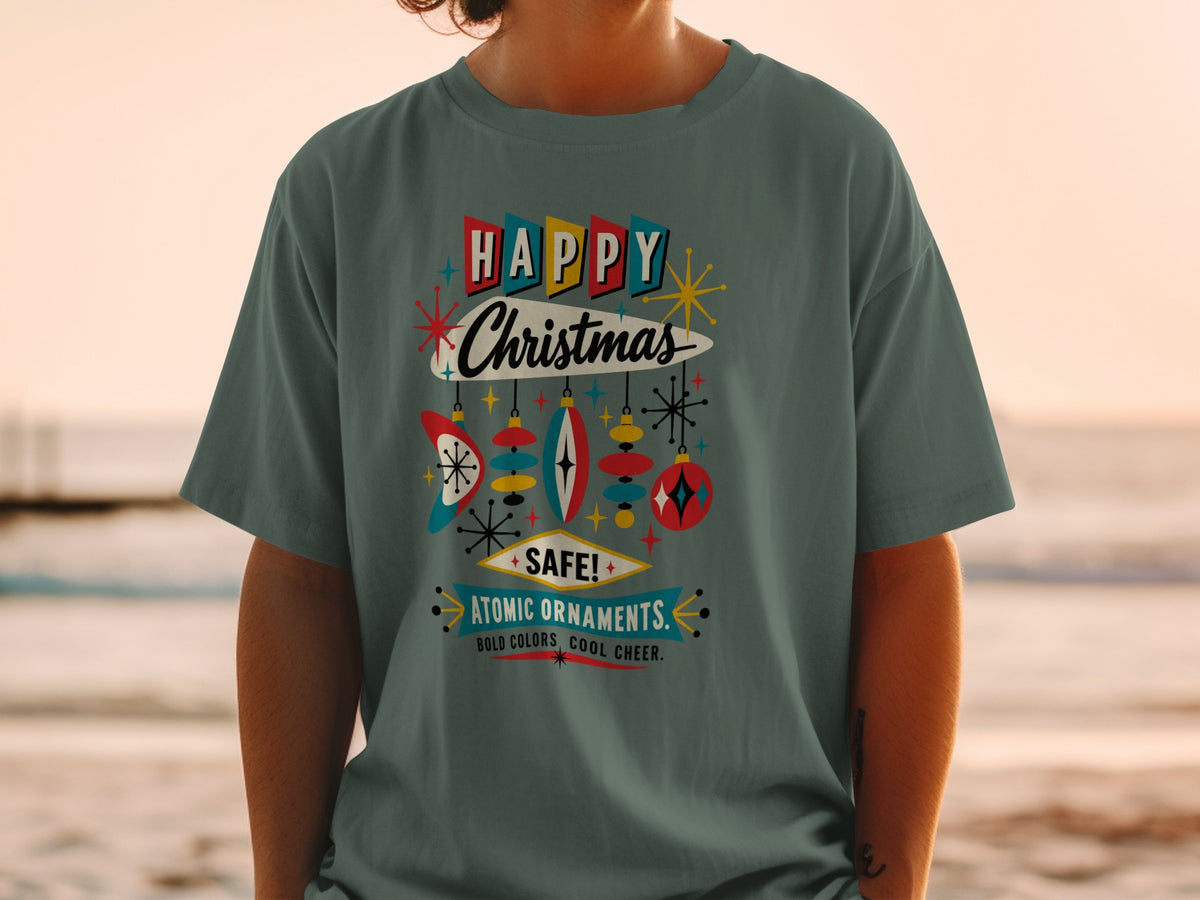 Green t-shirt with "Happy Christmas" and "Atomic Ornaments" in retro style.