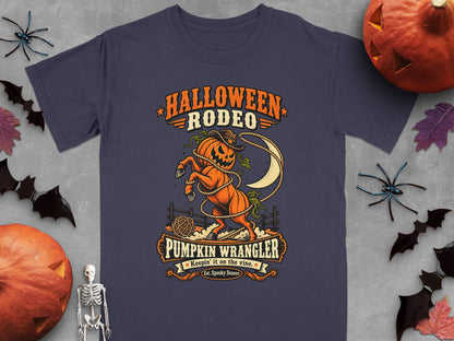 Halloween Rodeo graphic with pumpkin wrangler, cowboy hat, lasso, and moon.