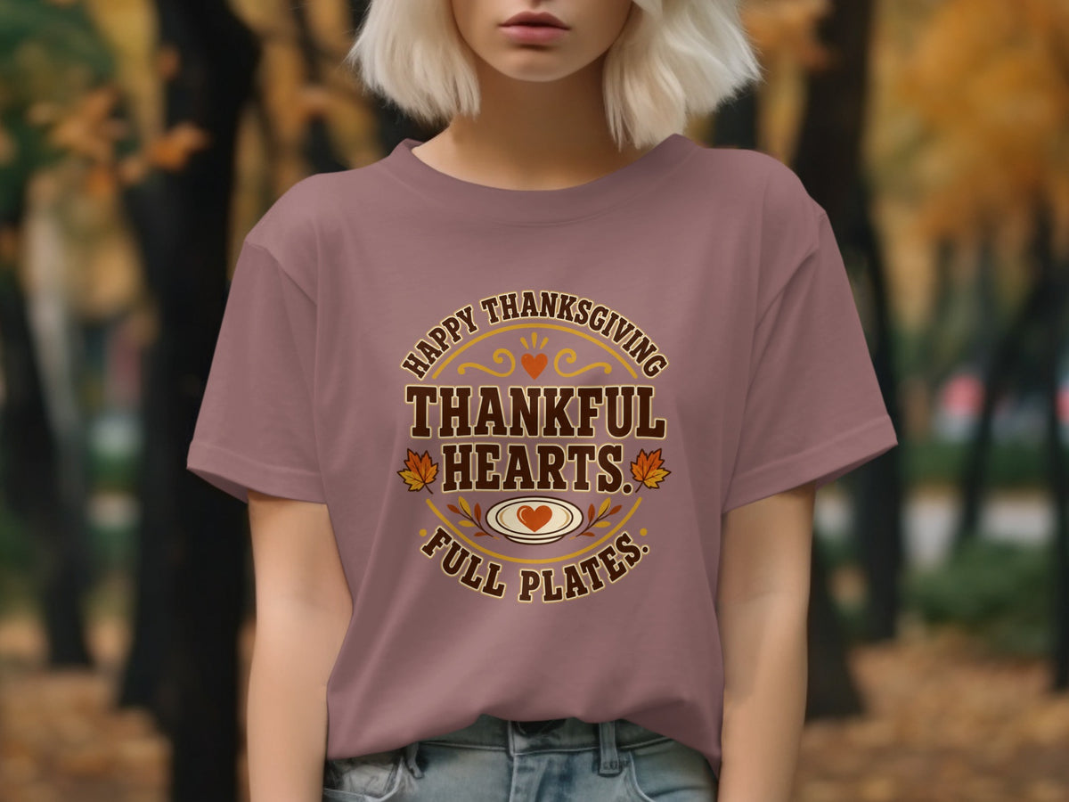 T-shirt with "Happy Thanksgiving, Thankful Hearts, Full Plates" text and Thanksgiving graphics.