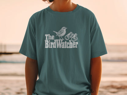 T-shirt with white graphic of a bird and binoculars, text "The BirdWatcher".